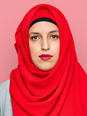 Beautiful hispanic woman wearing traditional islamic hijab scarf with serious expression on face. simple and natural looking at the camera. 
